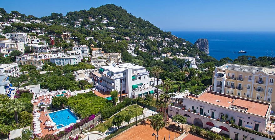 Hotel Syrene in Capri on the left of photo with swiming pool